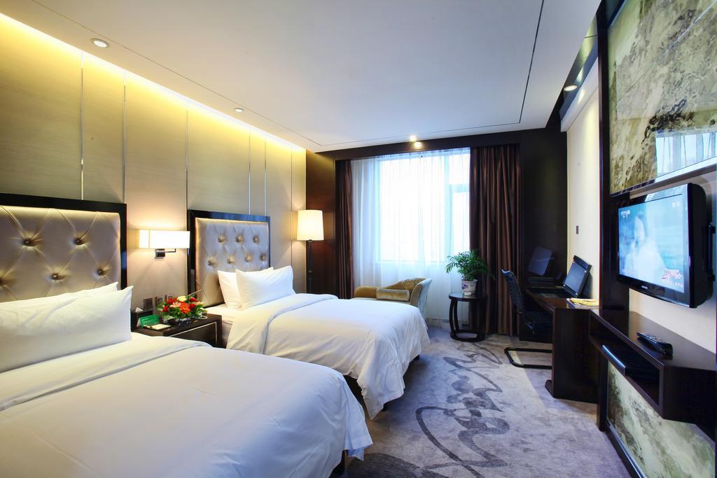 Xichang Minshan Hotel Habitación foto